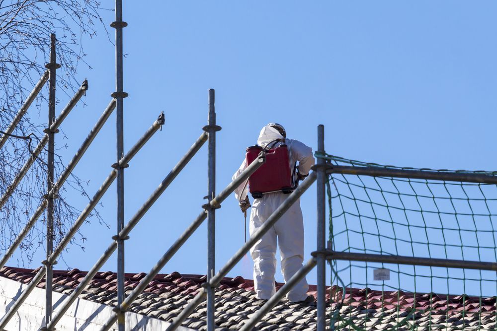 Asbestos Removal in a Residential Roof — Asbestos Removal in Mackay, QLD
