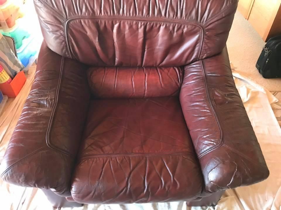 A Brown Leather Chair is Sitting on a White Cloth on the Floor — Abbsolve Services in Buderim, QLD