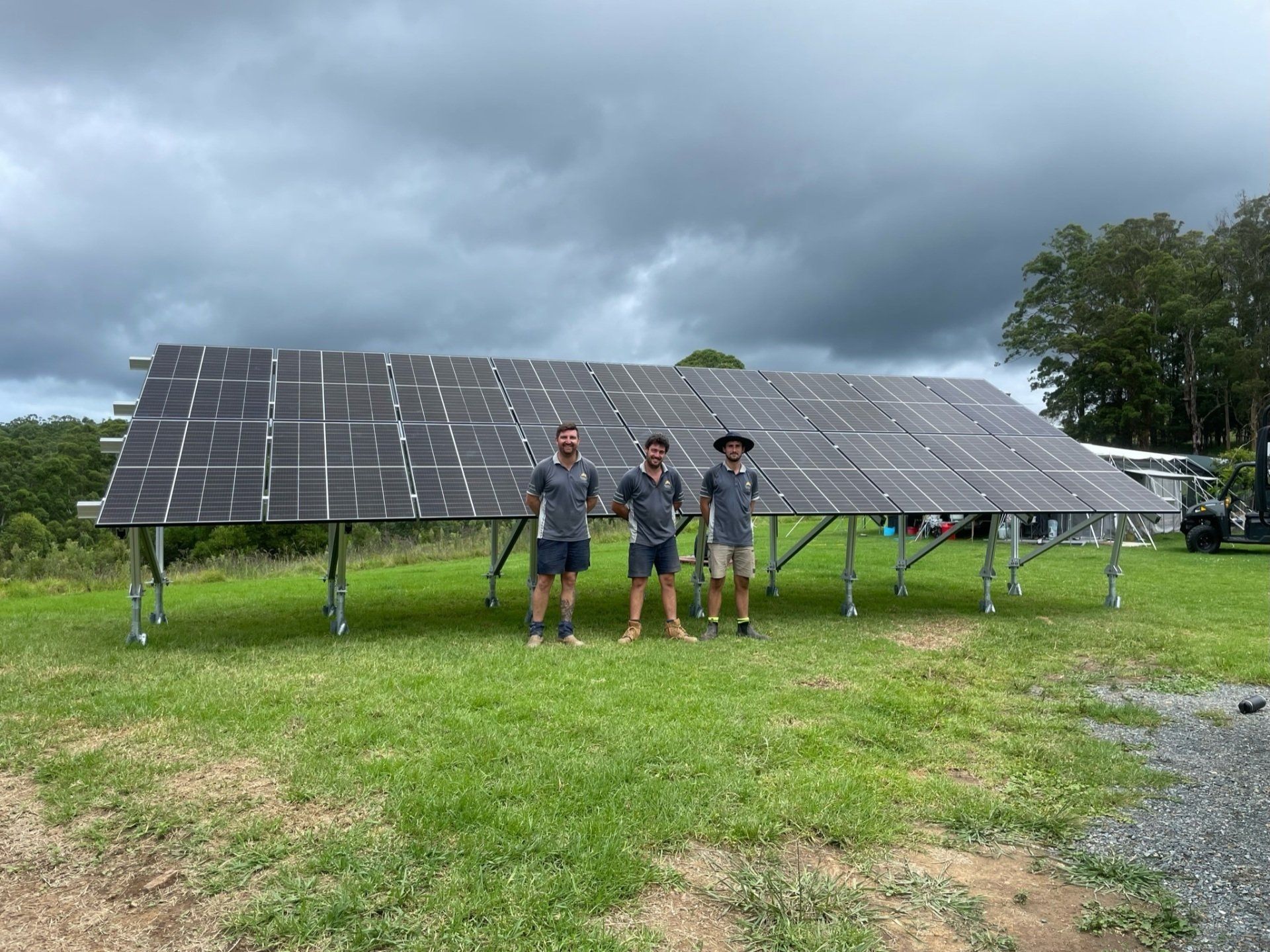 Solar Panel Technician Installing Solar Panels On Roof — Solar Electricians in Forster, NSW