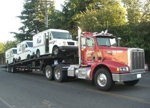 Big Truck with Container — Seattle, WA — Gary's Westside Towing