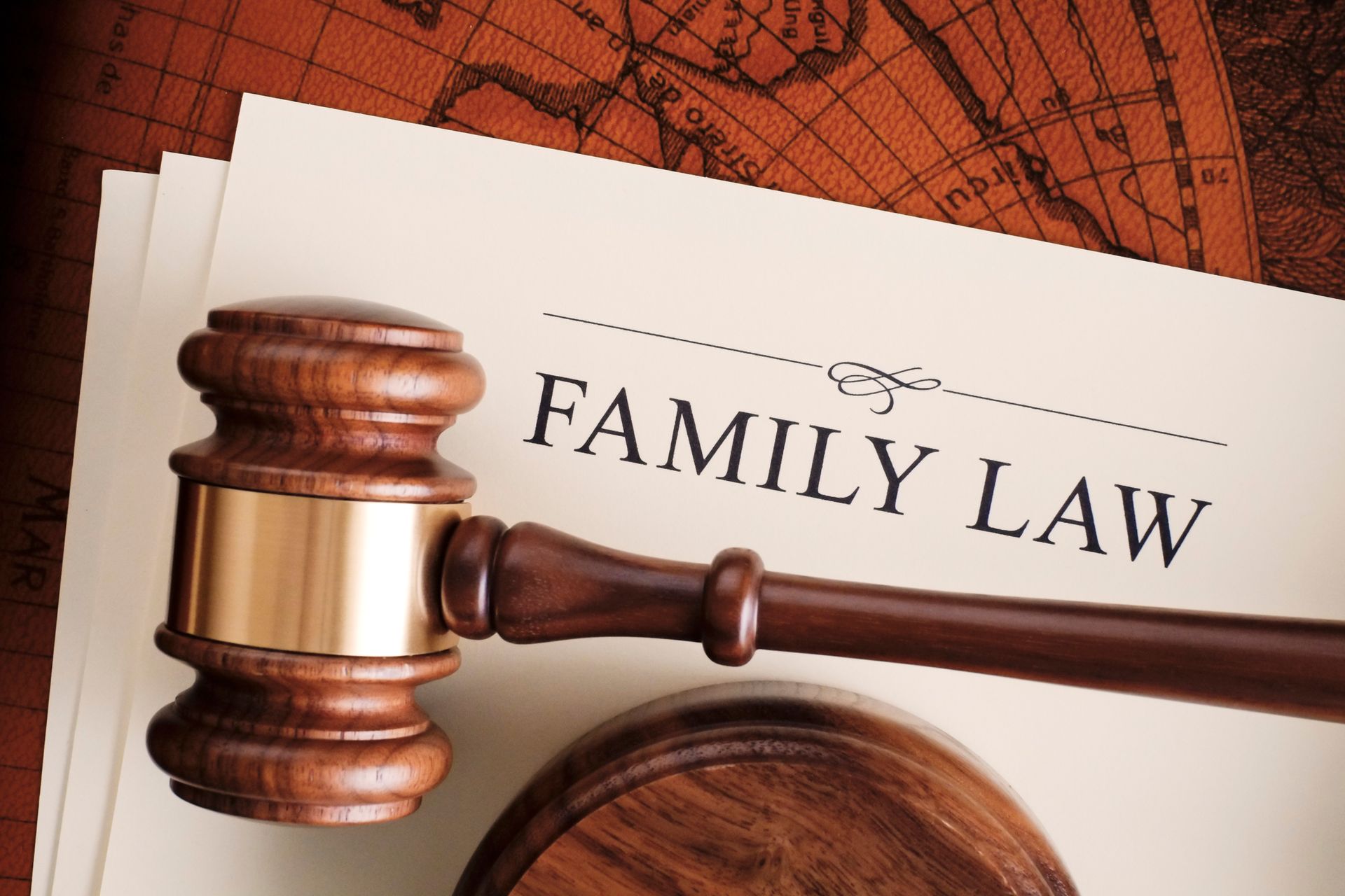 Family law specialist legal documents with a wooden judge's gavel highlighting legal services.