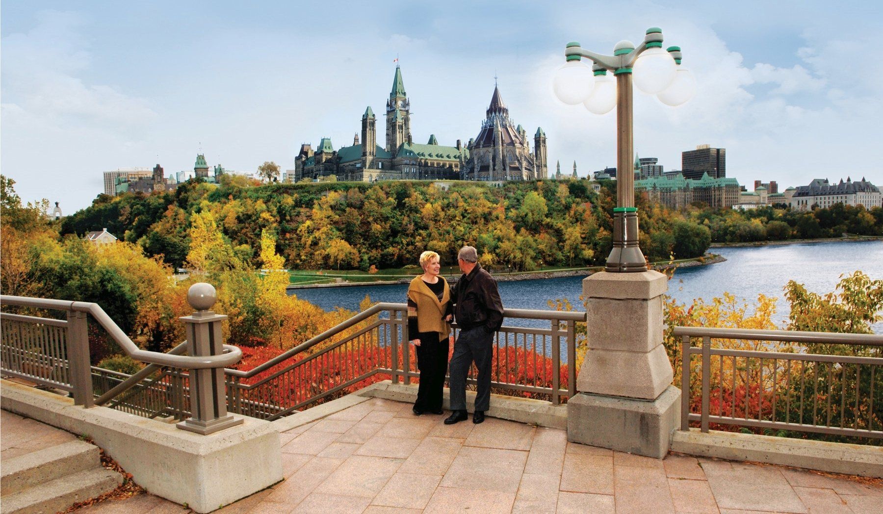 Couple on an Ottawa bridge in the fall