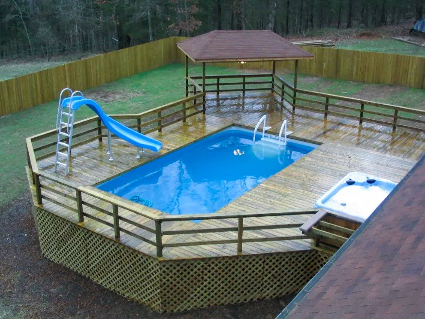 Simple custom pressure treated wood pool deck in Rochester NY from a few years back.