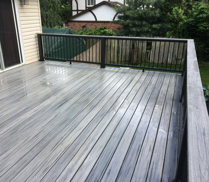 Beautiful light gunmetal gray pvc deck we installed in Rochester NY for a customer.