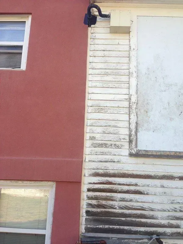 Two adjoining house walls.