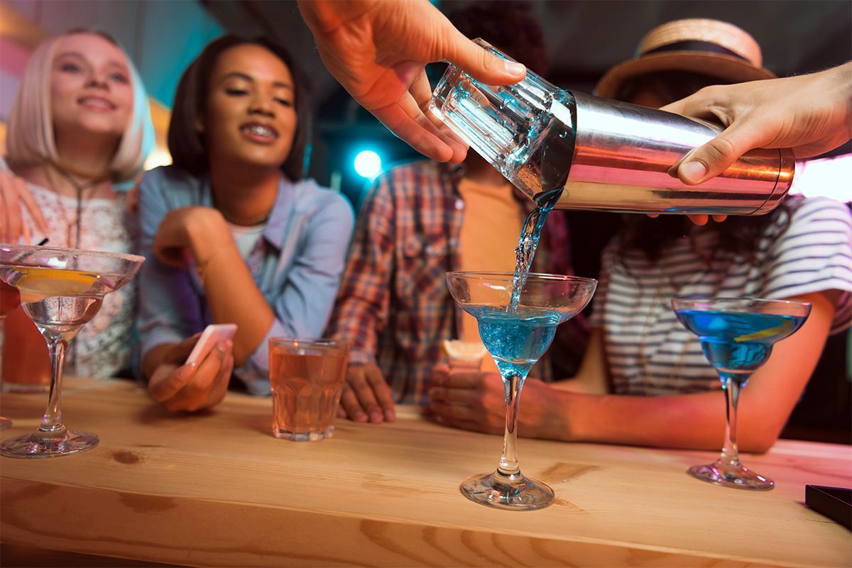 friends drinking alcohol at a bar in Louisiana