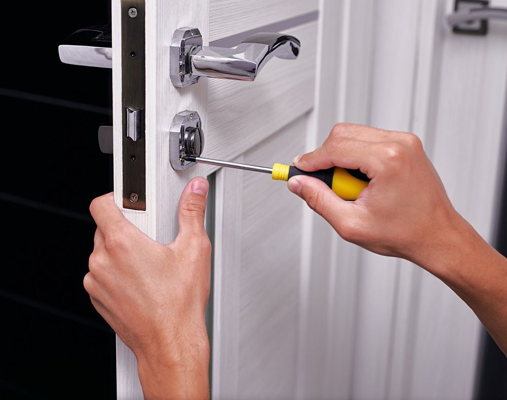 Expertly Repairing The Room's Door Lock With Precision And Skill — FNQ Locksmiths in Wonga Beach, QLD