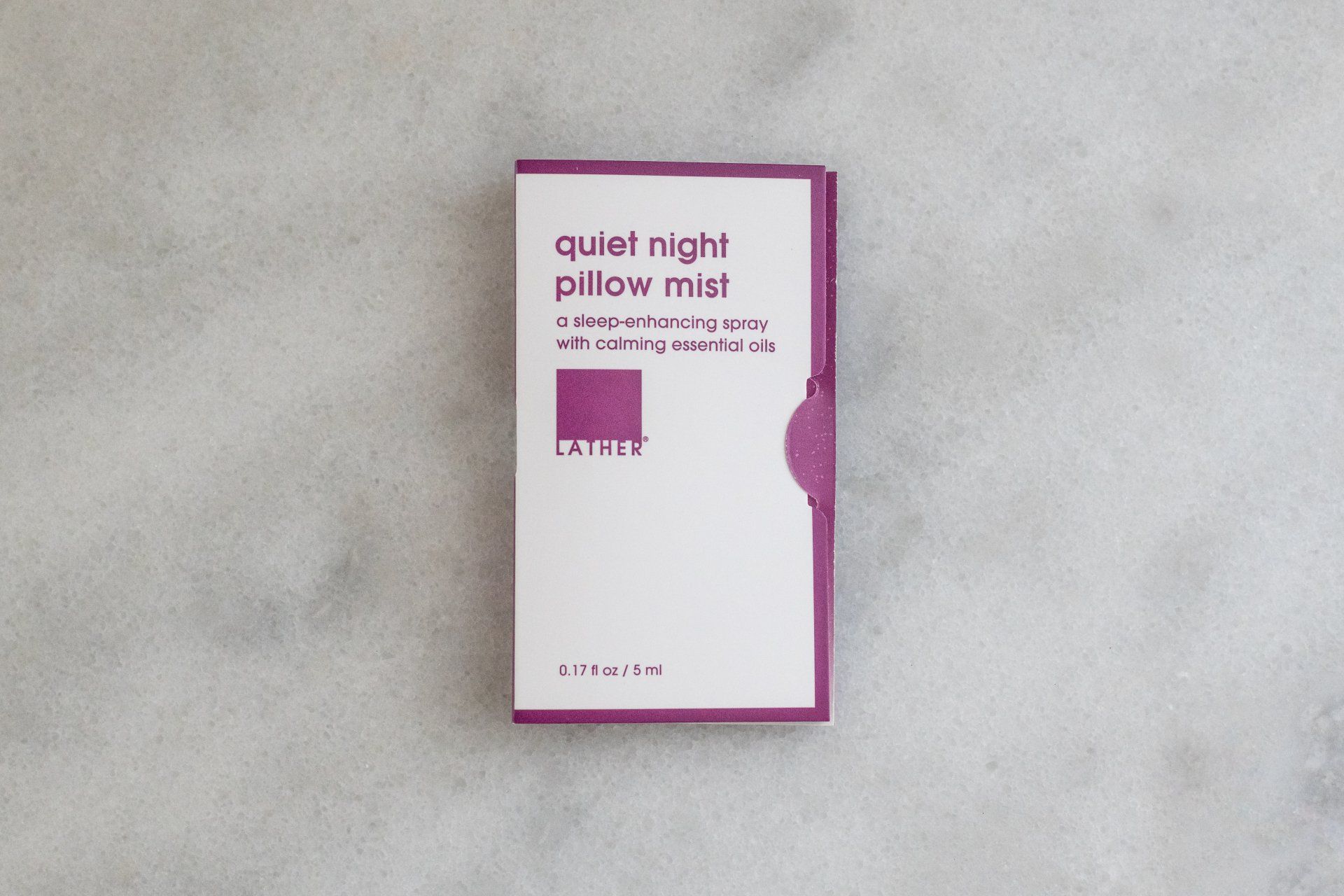 A purple and white book titled quiet night pillow mist