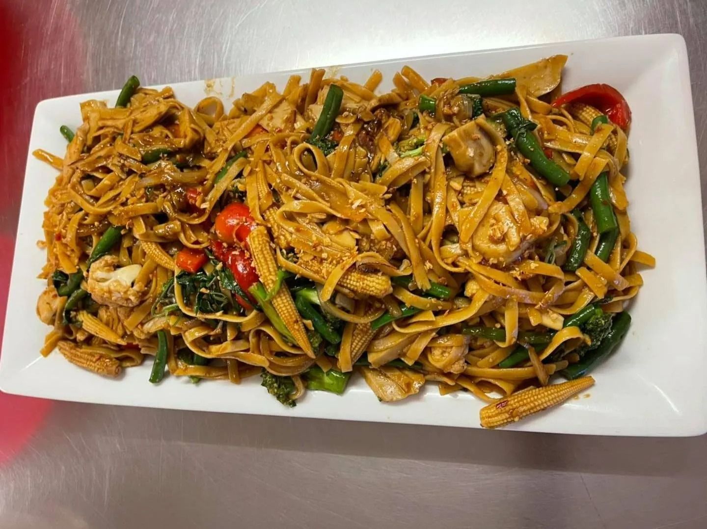 Pasta Dish With Vegetables, Including Green Beans, Red Peppers, and Baby Corn — Thai Taste Restaurant in Norman Gardens, QLD