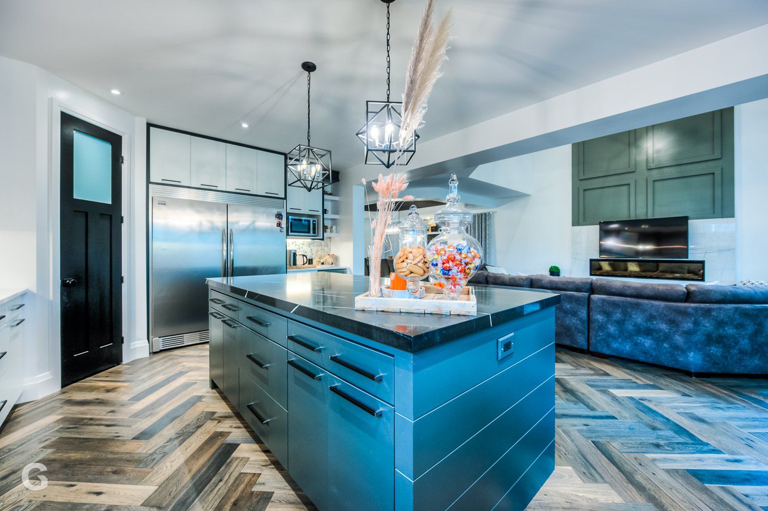 There is a large island in the middle of the kitchen.