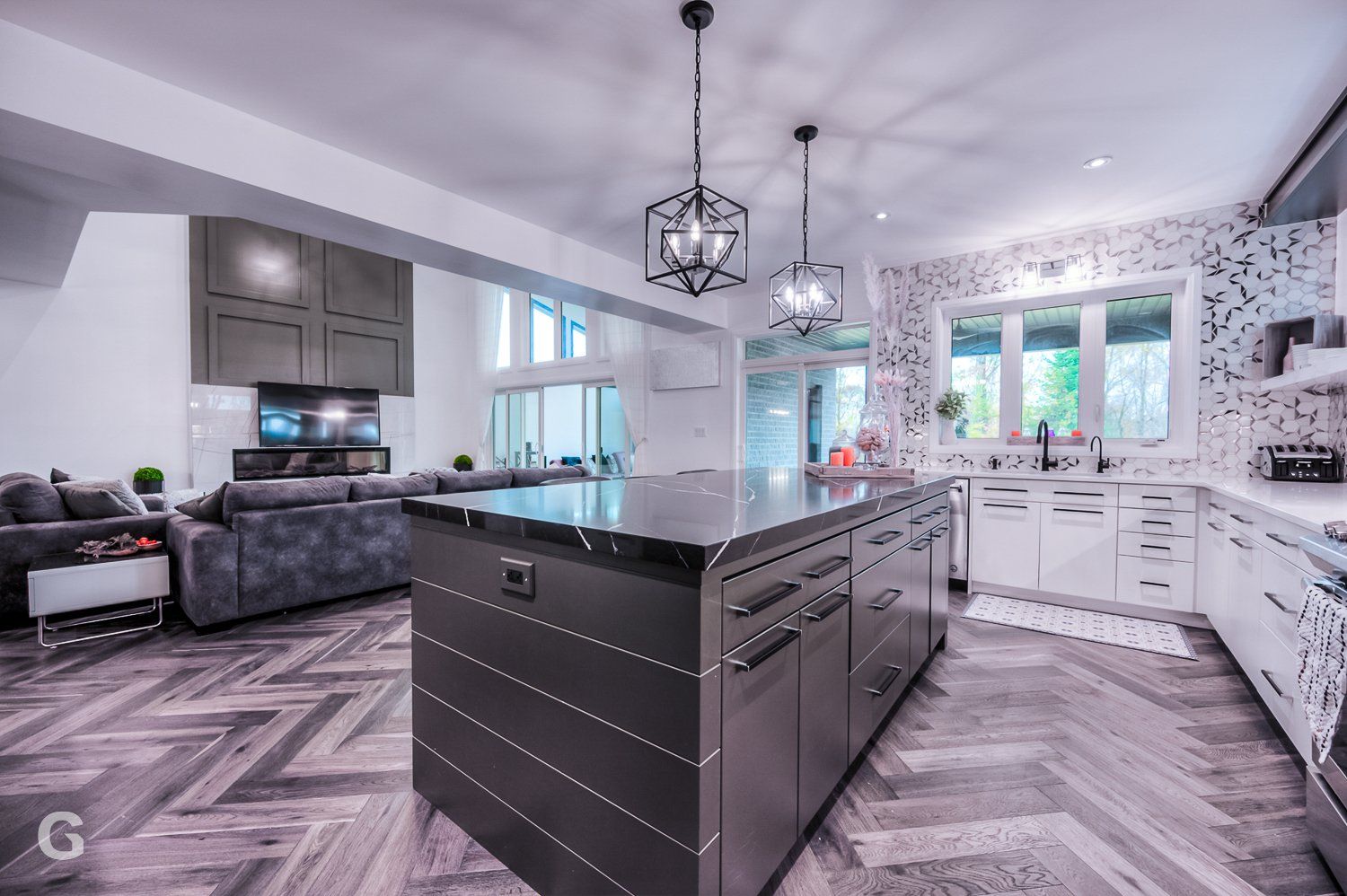 There is a large island in the middle of the kitchen.