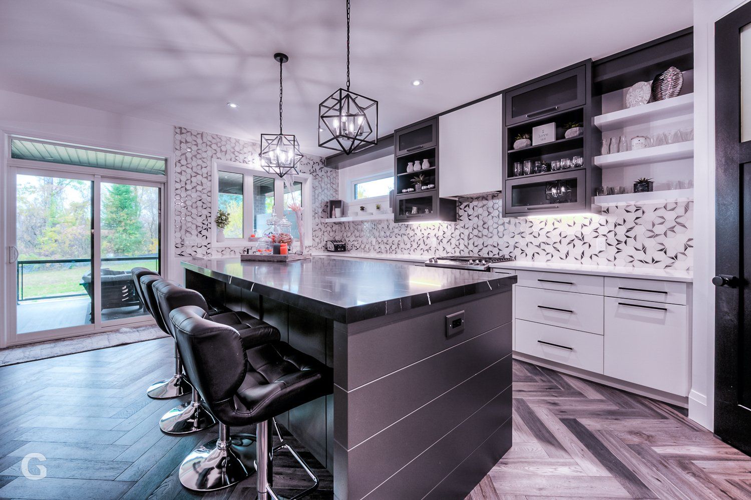 There is a large island in the middle of the kitchen.