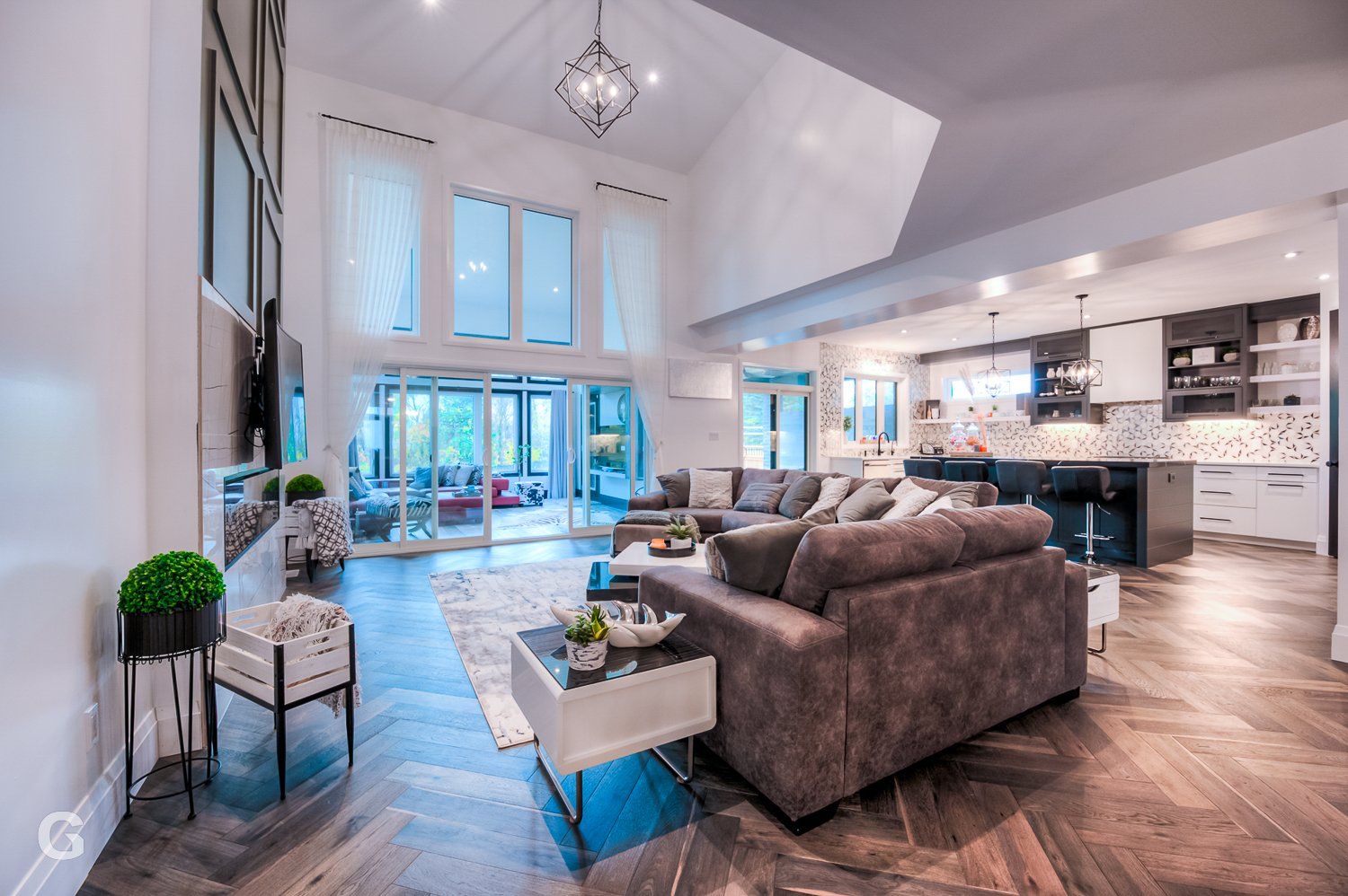 A living room with a couch and a table in a house.
