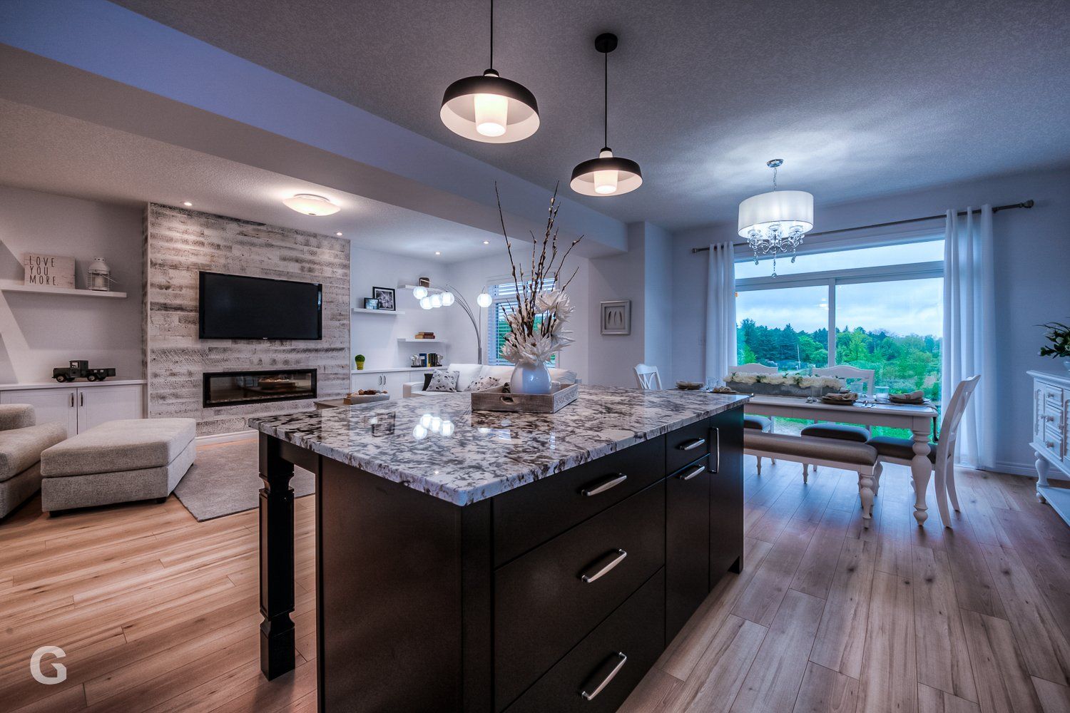 A kitchen with a large island in the middle of it