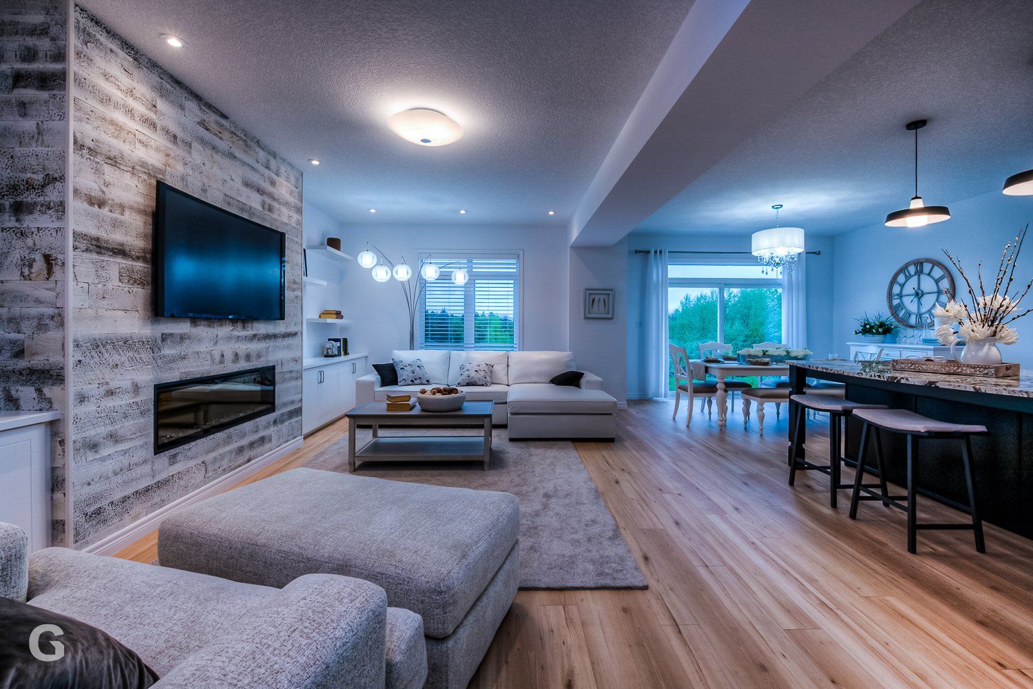 A living room filled with furniture and a flat screen tv.