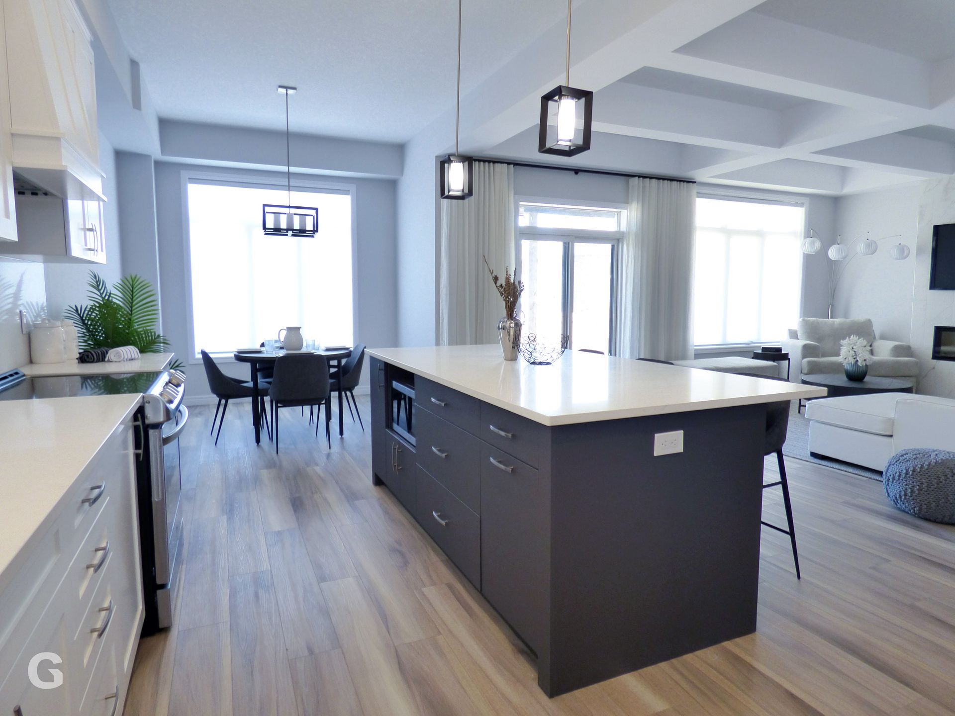 A kitchen with a large island in the middle of it