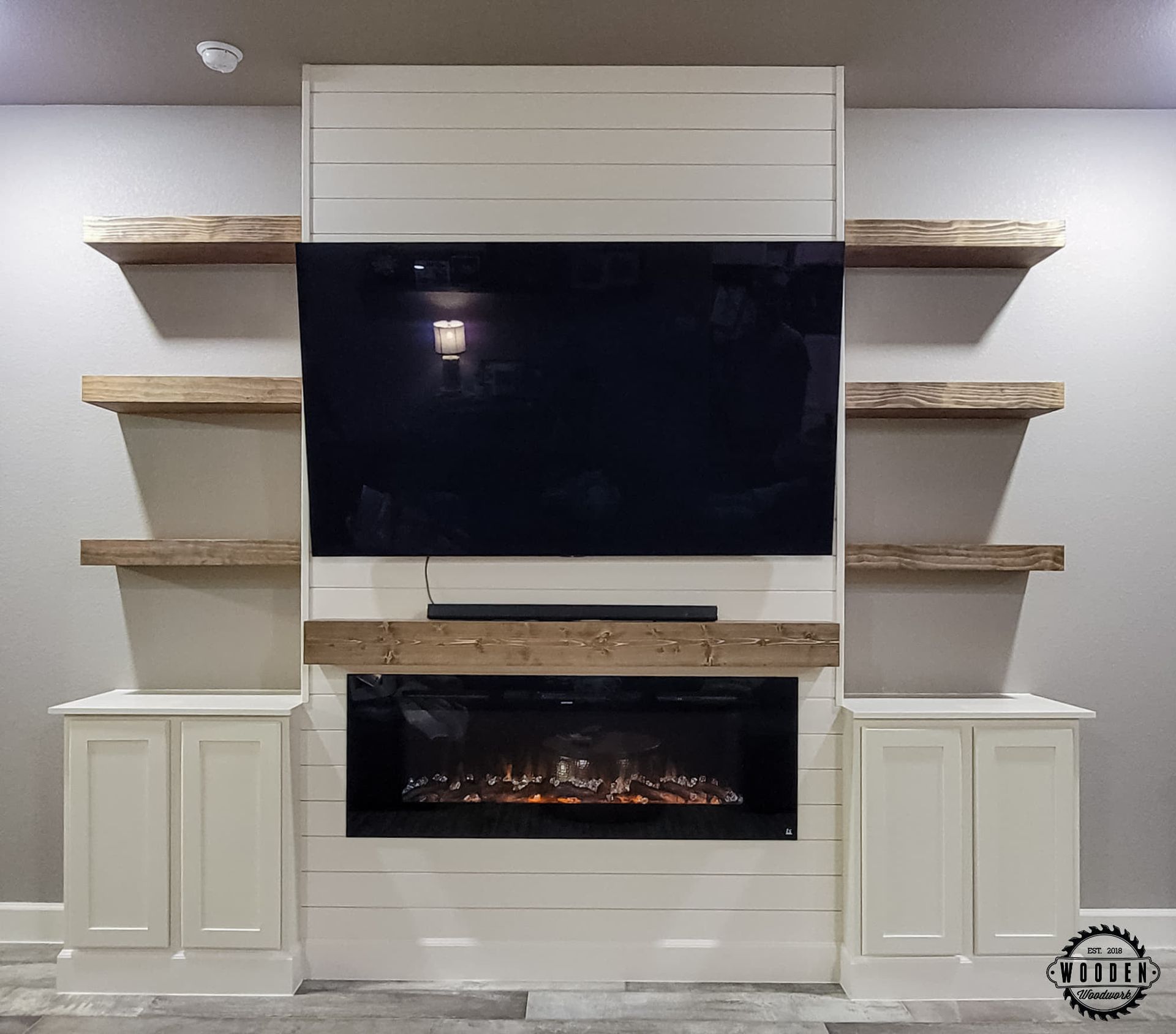 Closeup View of TV with Shelves — Austin, TX — Wooden Woodworks LLC