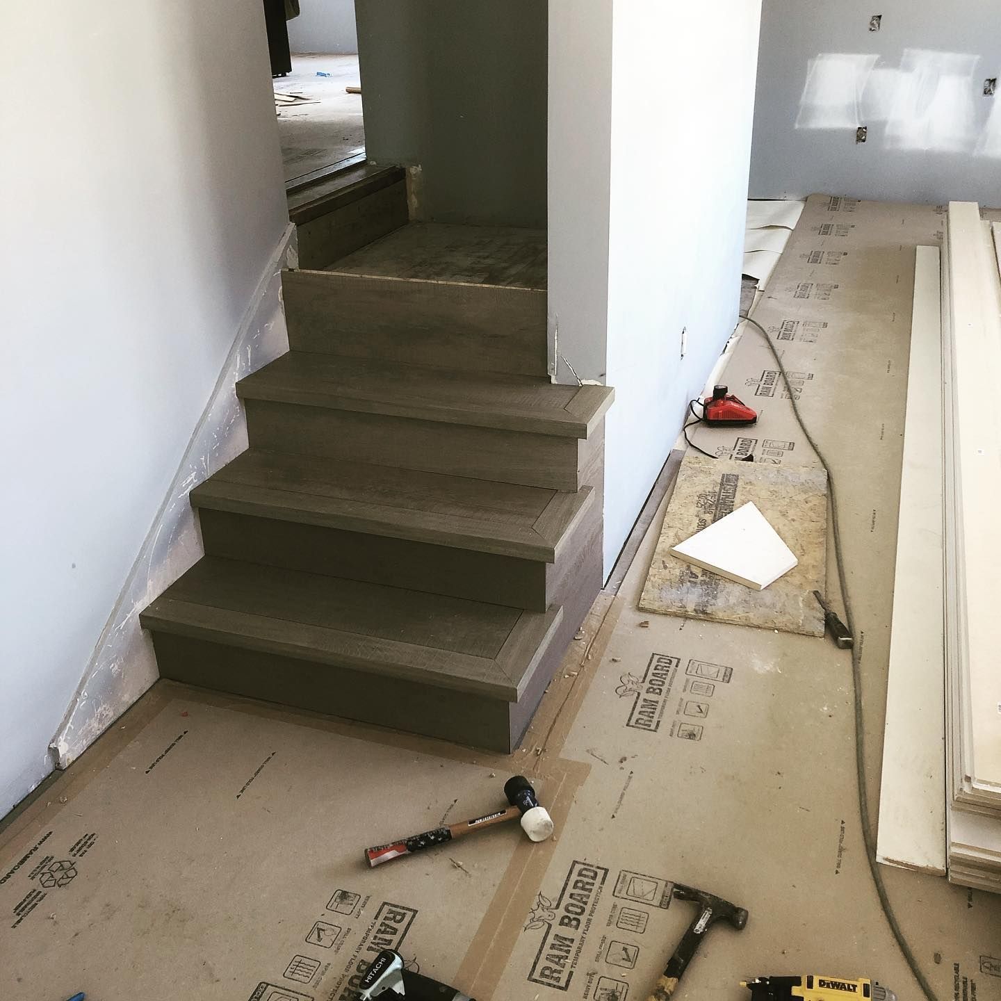 A staircase is being built in a house and the steps are made of concrete