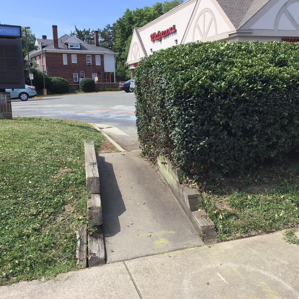 A ramp leading up to a building that says walgreens