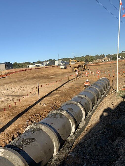 Installing Drainage System — Industrial & Residential Projects in Orange, NSW