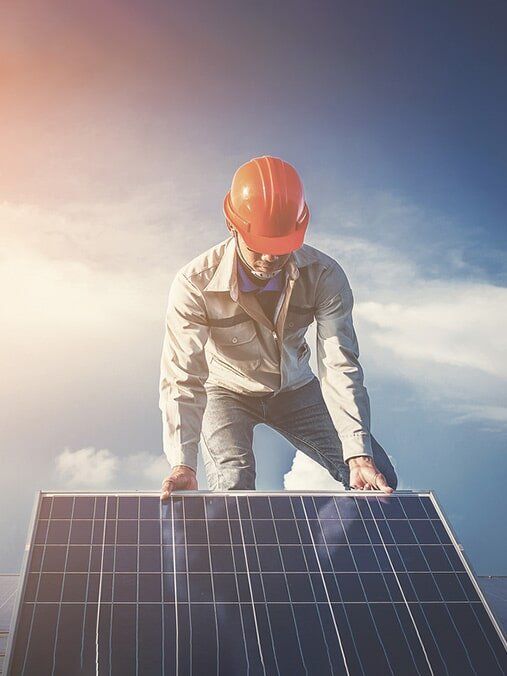 Contractor Installing Solar Panel — Industrial & Residential Projects in Orange, NSW