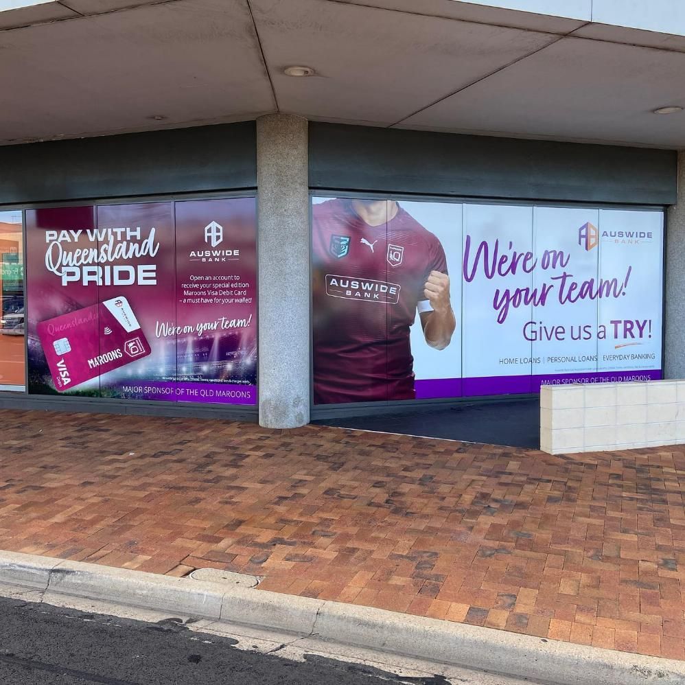 A Store Front with A Sign that Says We Are on Your Team — Signmax Bundaberg In Kensington, QLD