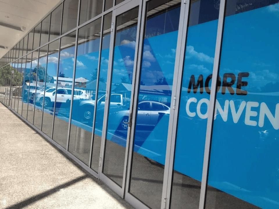 A Store Front with A Sign that Says More Convenient — Signmax Bundaberg In Kensington, QLD