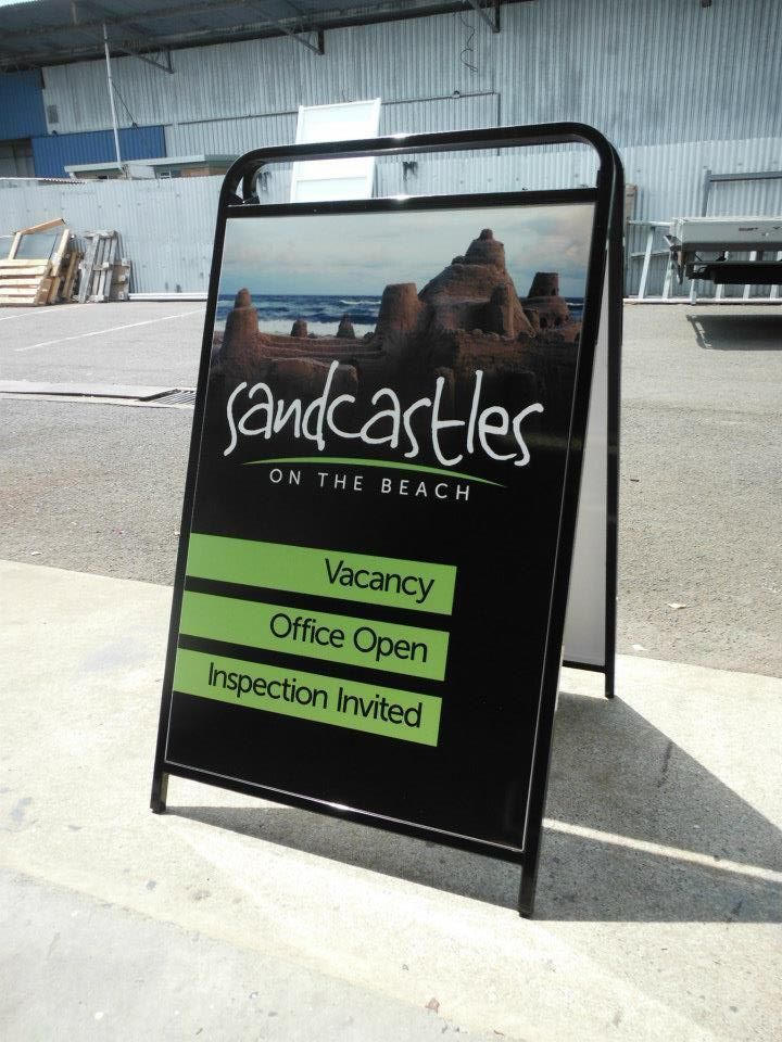 A Sign that Says Sandcastles on The Beach on It — Signmax Bundaberg In Kensington, QLD