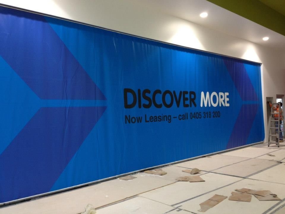 A Large Blue Sign that Says Discover More on It — Signmax Bundaberg In Kensington, QLD