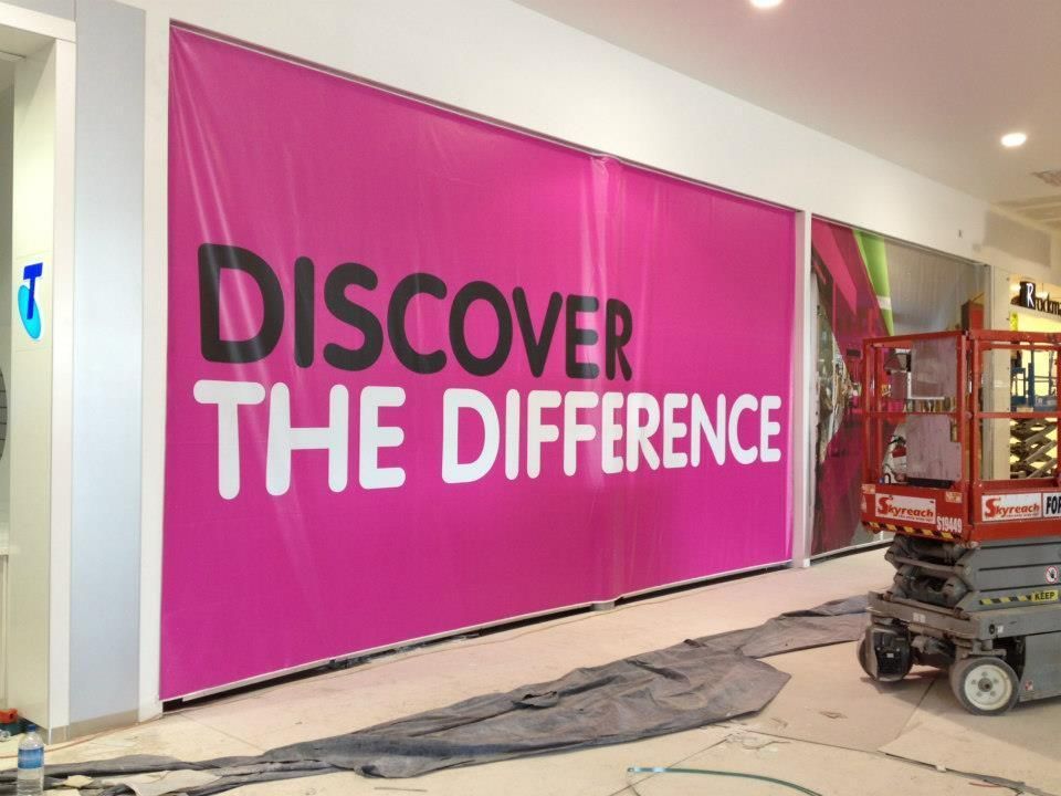 A Large Pink Sign that Says Discover the Difference — Signmax Bundaberg In Kensington, QLD