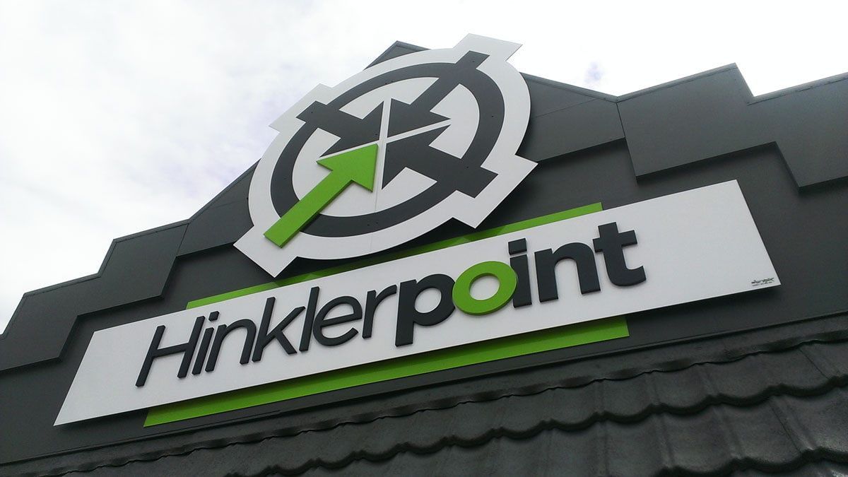 A Commercial Sign on a Building Facade — Signmax Bundaberg In Kensington, QLD