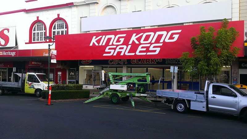 Storefront With a Bold Red Sign and White Lettering — Signmax Bundaberg In Kensington, QLD