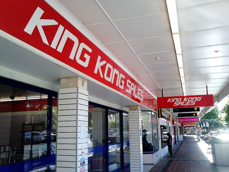 Storefront With a Bold Red Sign — Signmax Bundaberg In Kensington, QLD