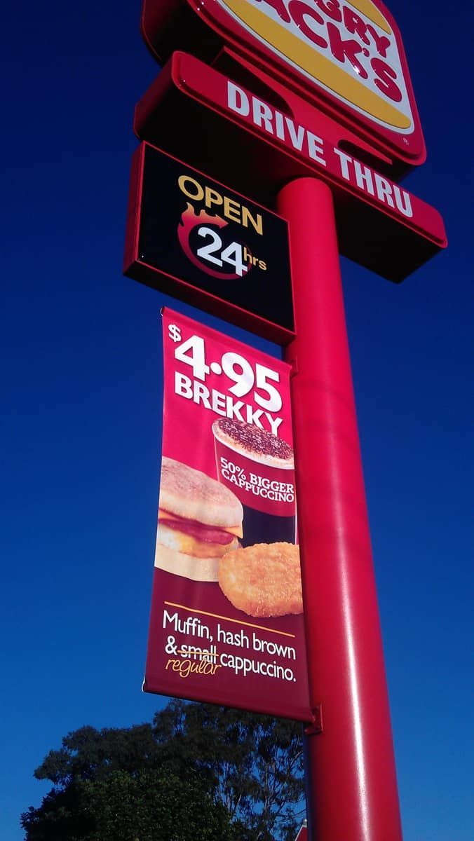 Fast-food Restaurant Sign Against a Clear Blue Sky — Signmax Bundaberg In Kensington, QLD