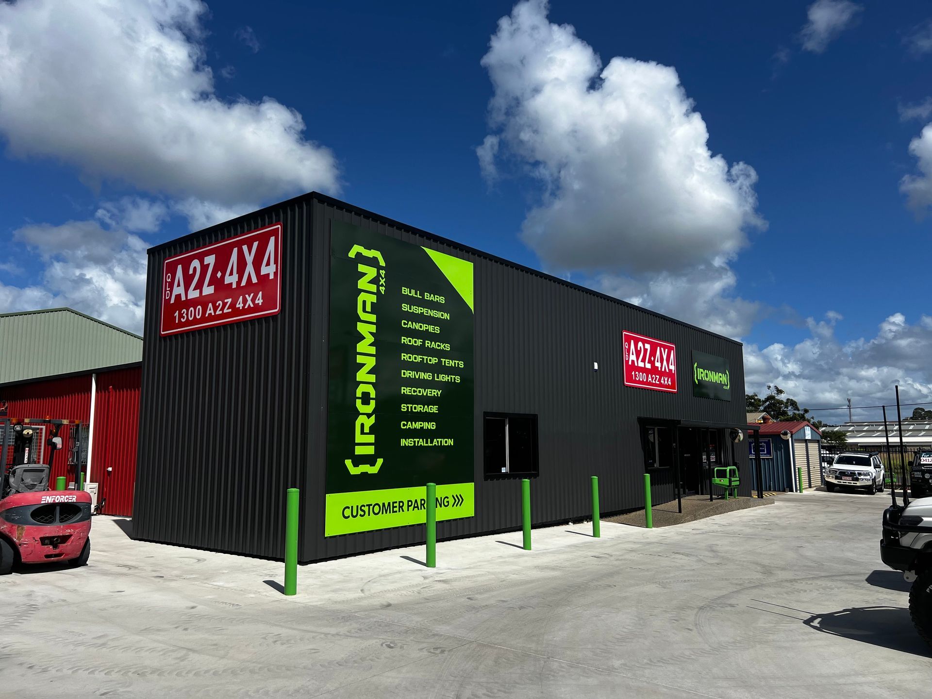 A Sleek Black Carbon Fibre Car Hood — Signmax Bundaberg In Kensington, QLD