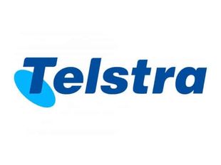 The Telstra logo: the word "Telstra" in dark blue next to a tilted, light blue oval.