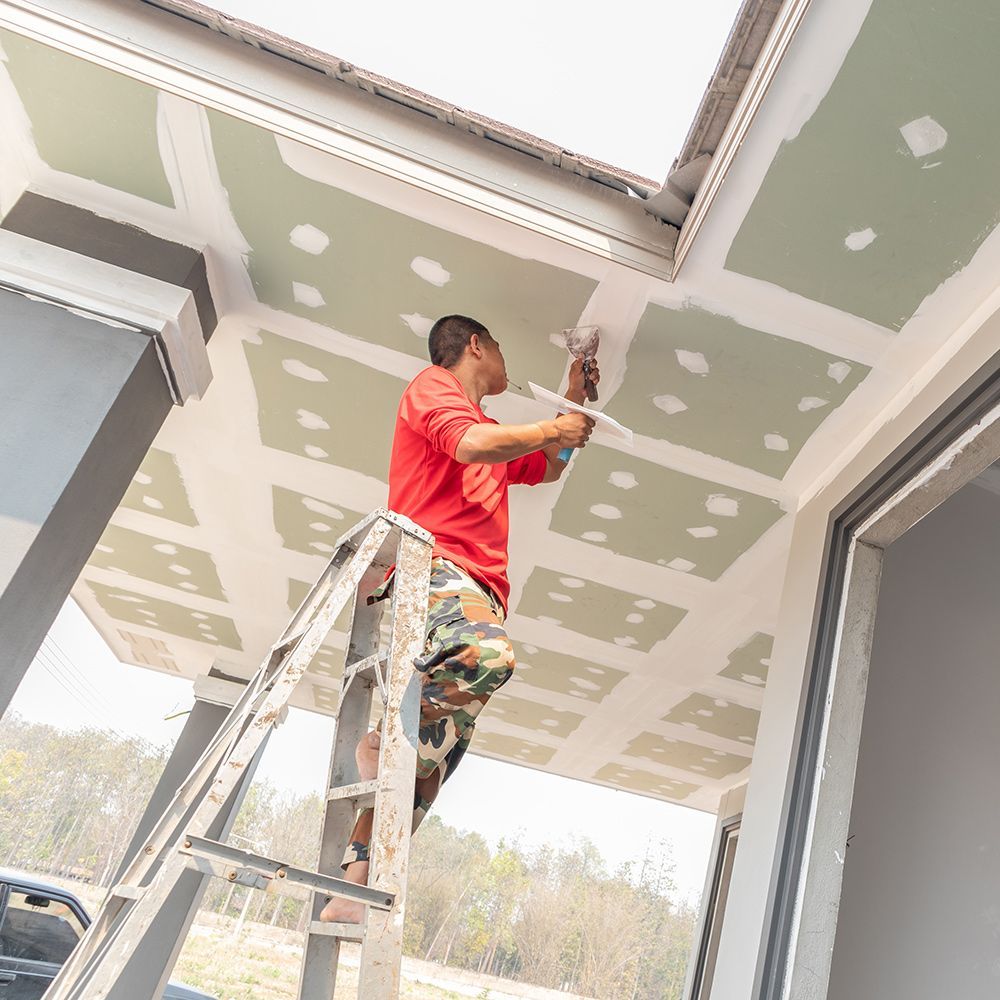 Man Doing Drywall Repair