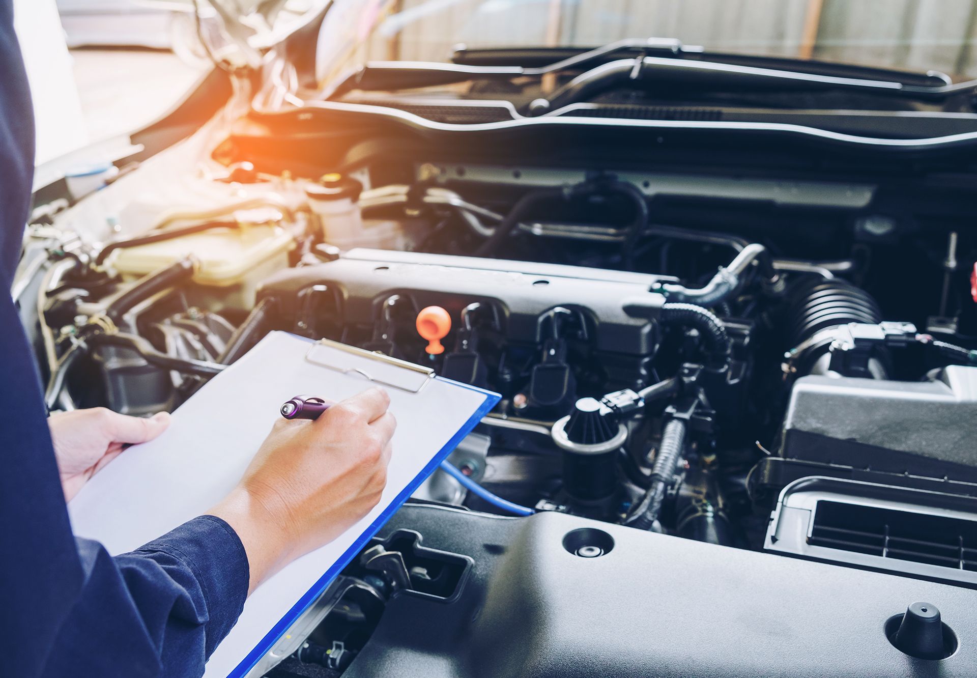 Mechanic Holding A Clipboard