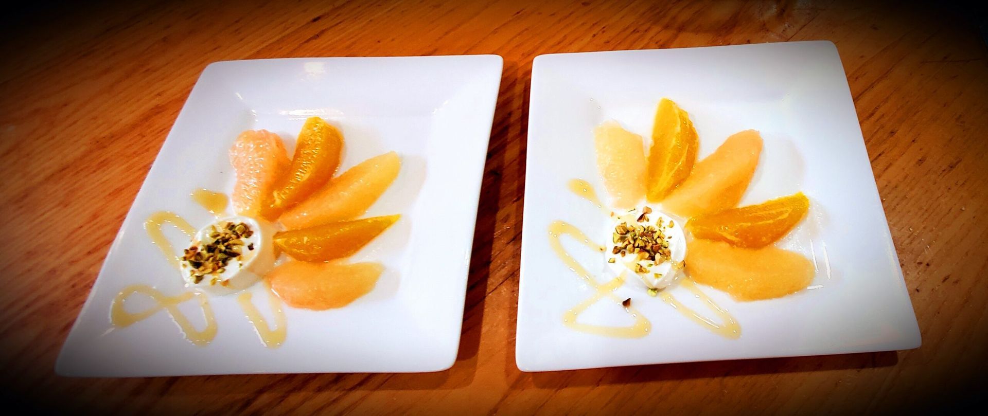 Two square plates with a flower design on them
