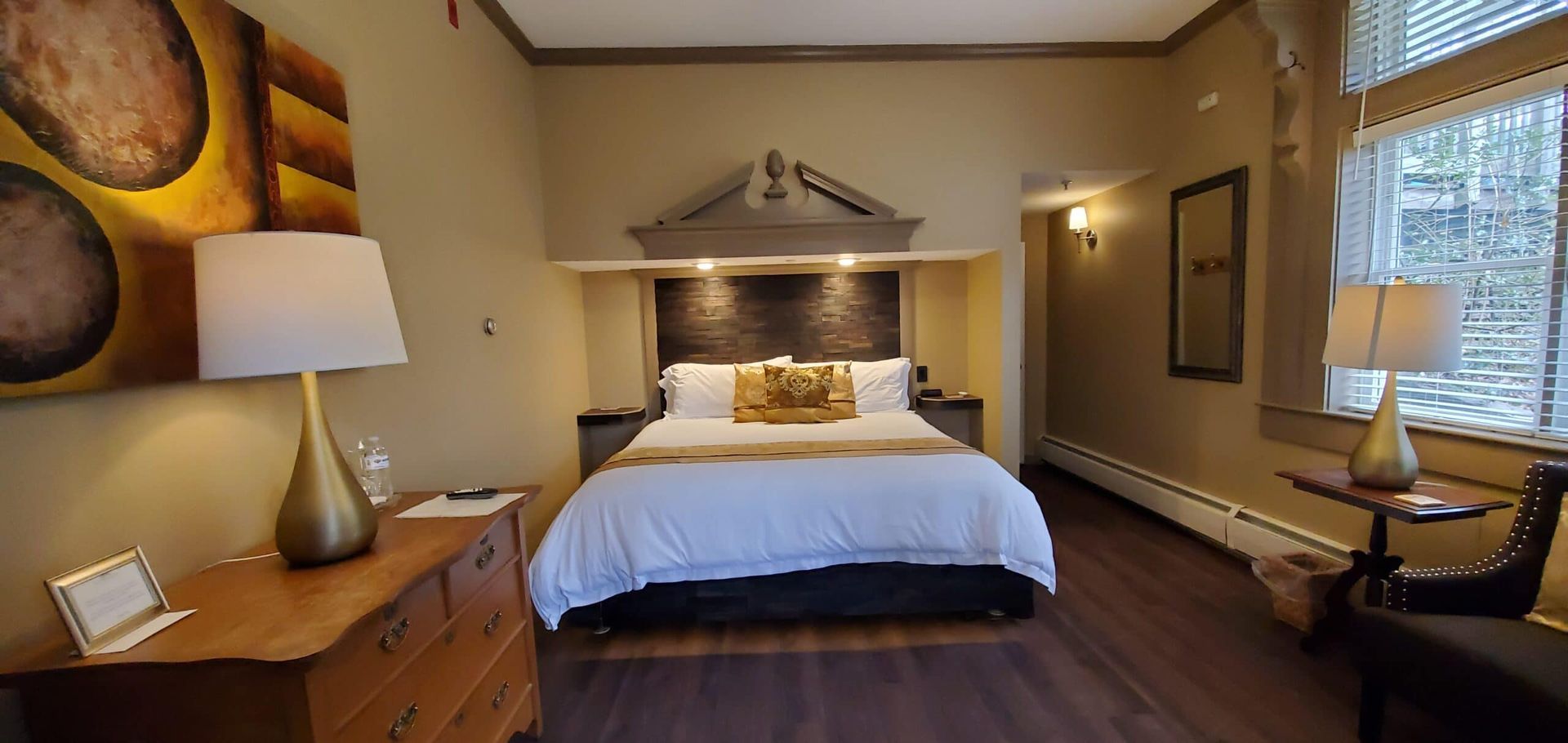 There is a large bed in the middle of the room.