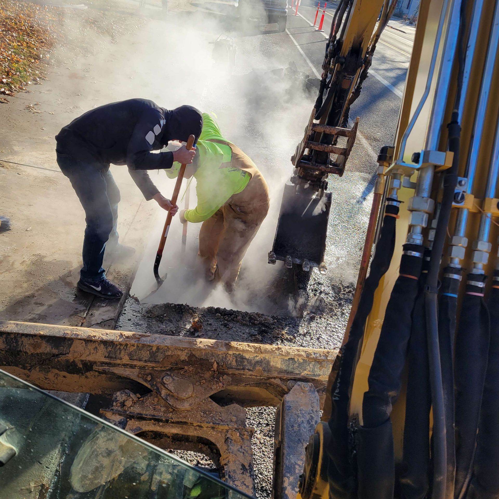 Workers Digging a Hole in the Ground