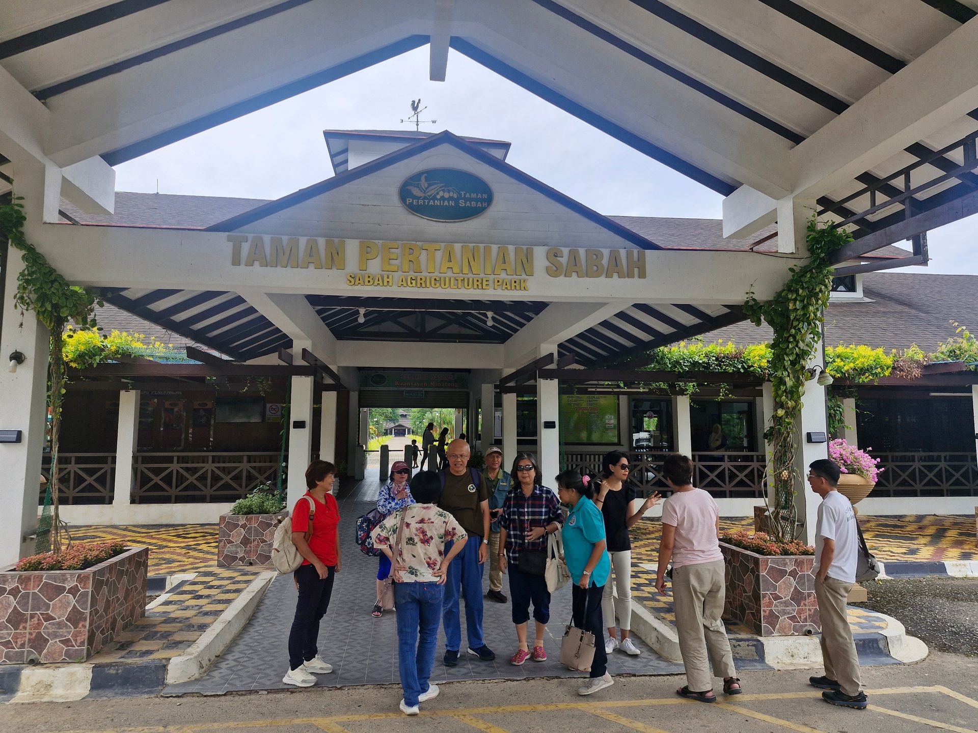 Children embracing a globe, campaign banner: