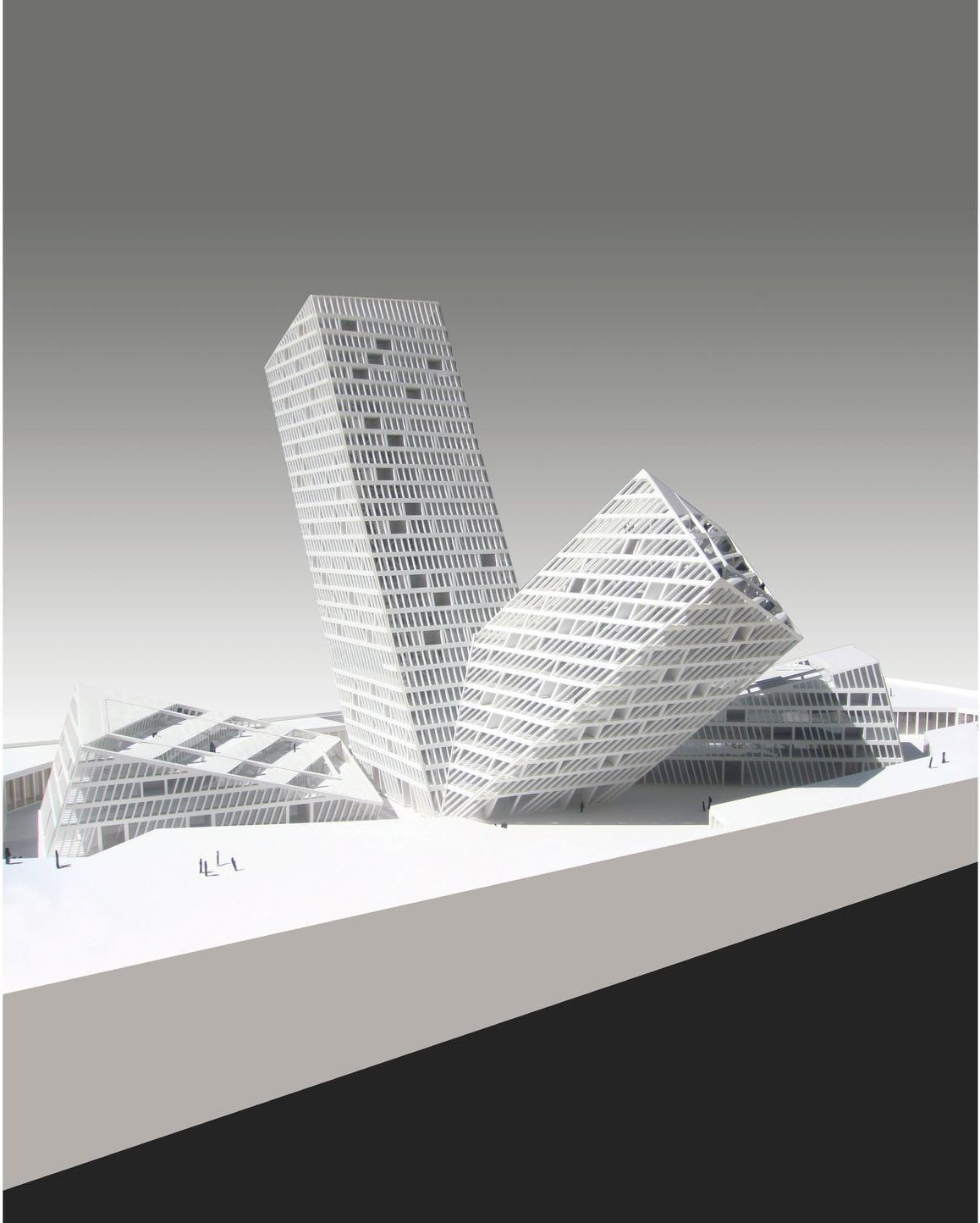 Un modelo en blanco y negro de un edificio sobre una mesa.