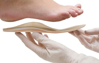 Doctor adapts insole — Podiatry Clinic in Eugene, OR