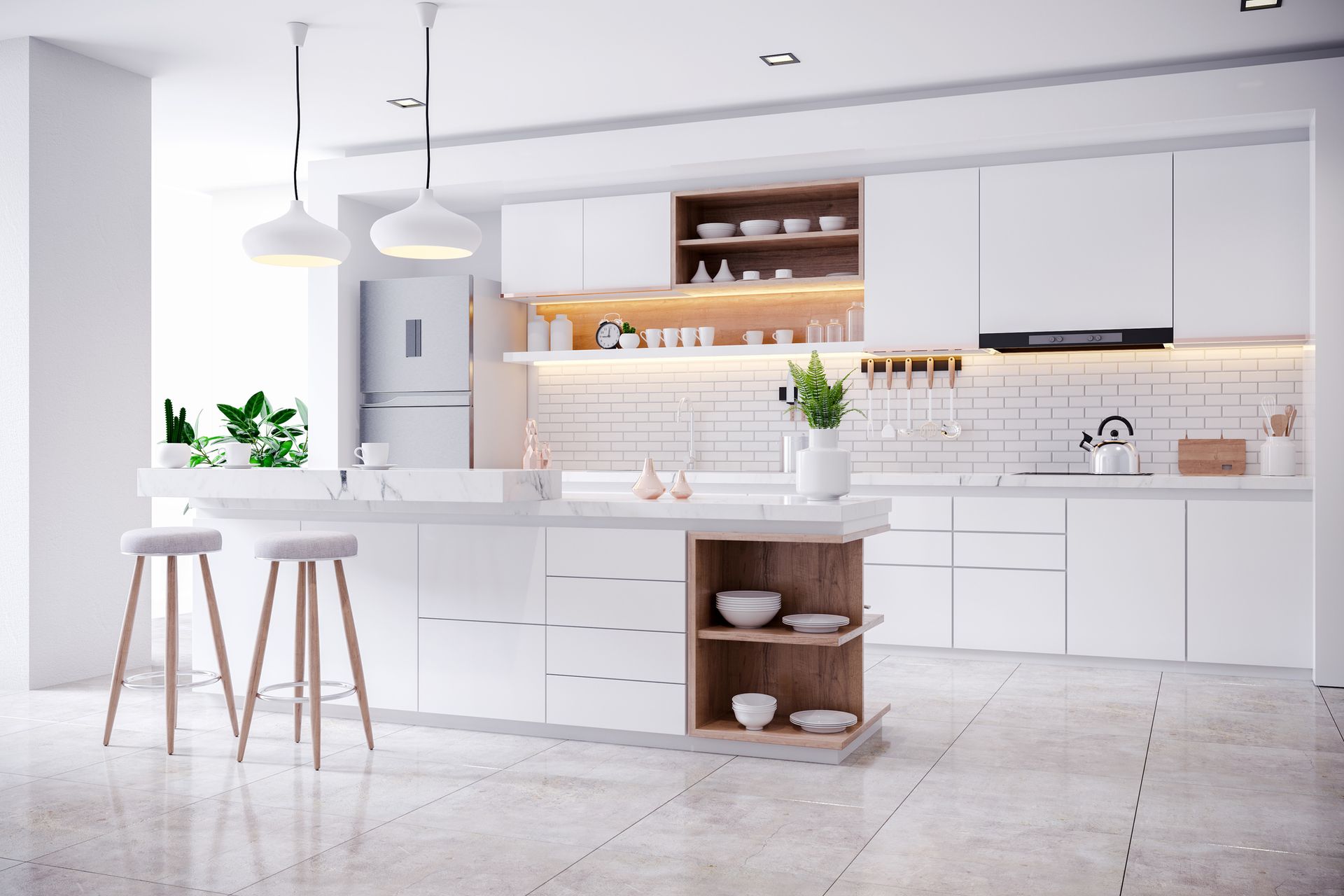 Modern kitchen with white cabinets, a marble-topped island, wooden shelving accents, and two stools on a tiled floor.