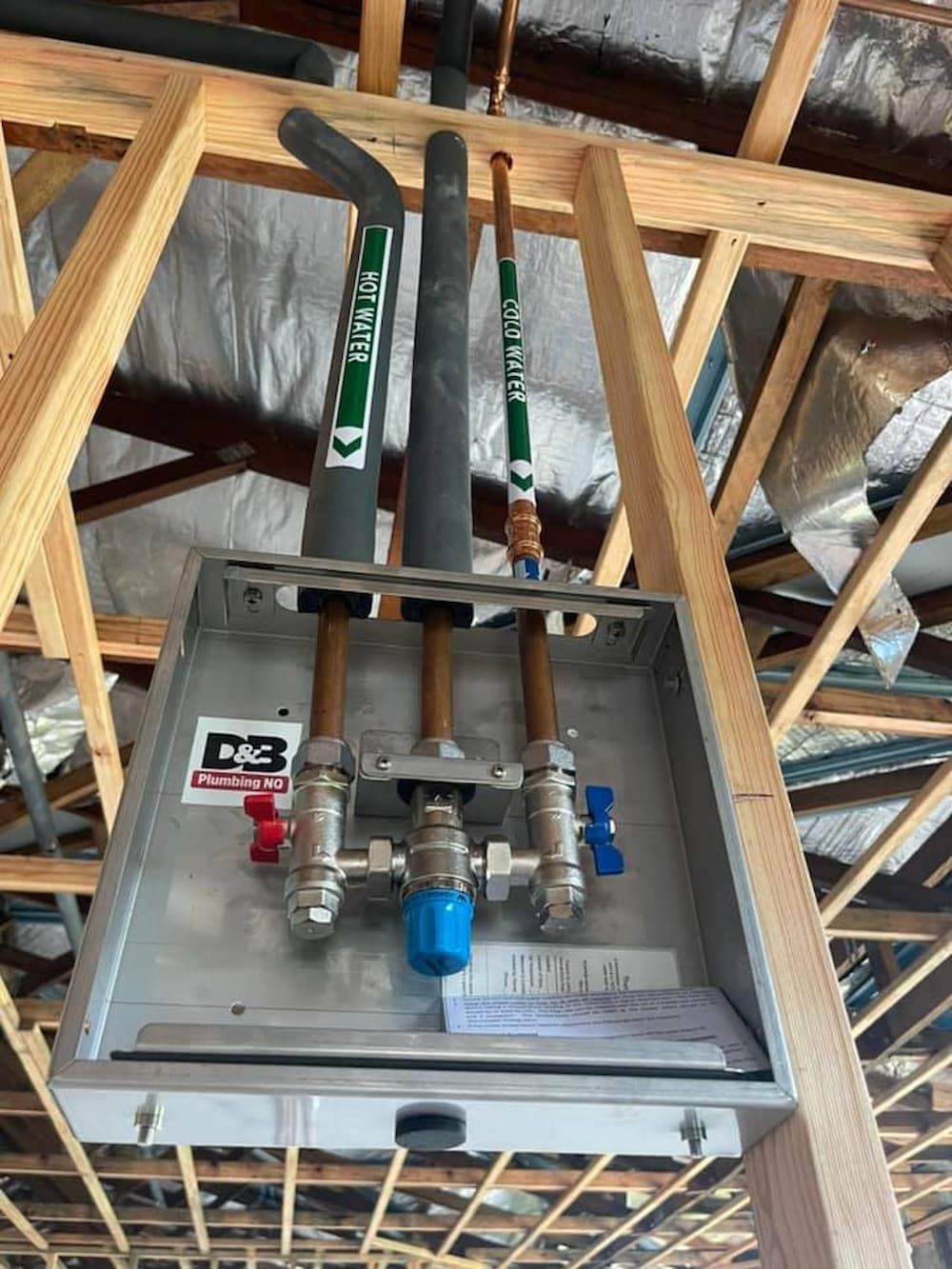Plumbing Rough-in With Pipes Labeled and Insulated in a Metal Box — D & B Plumbing NQ in Trinity Beach, QLD