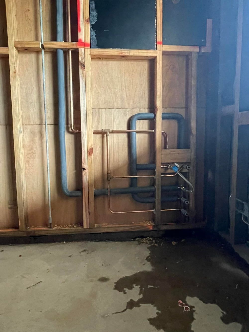 Water Leaking From Pipes in an Unfinished Room — D & B Plumbing NQ in Kanimbla, QLD