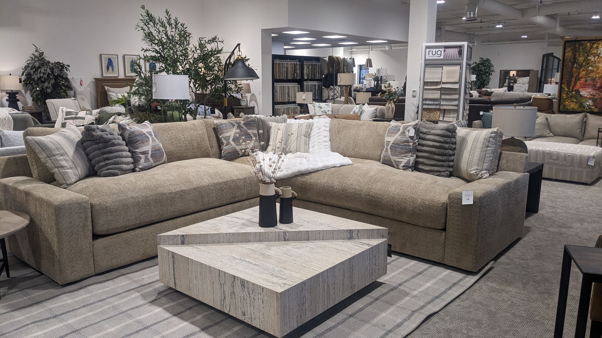 A living room filled with furniture and a coffee table.