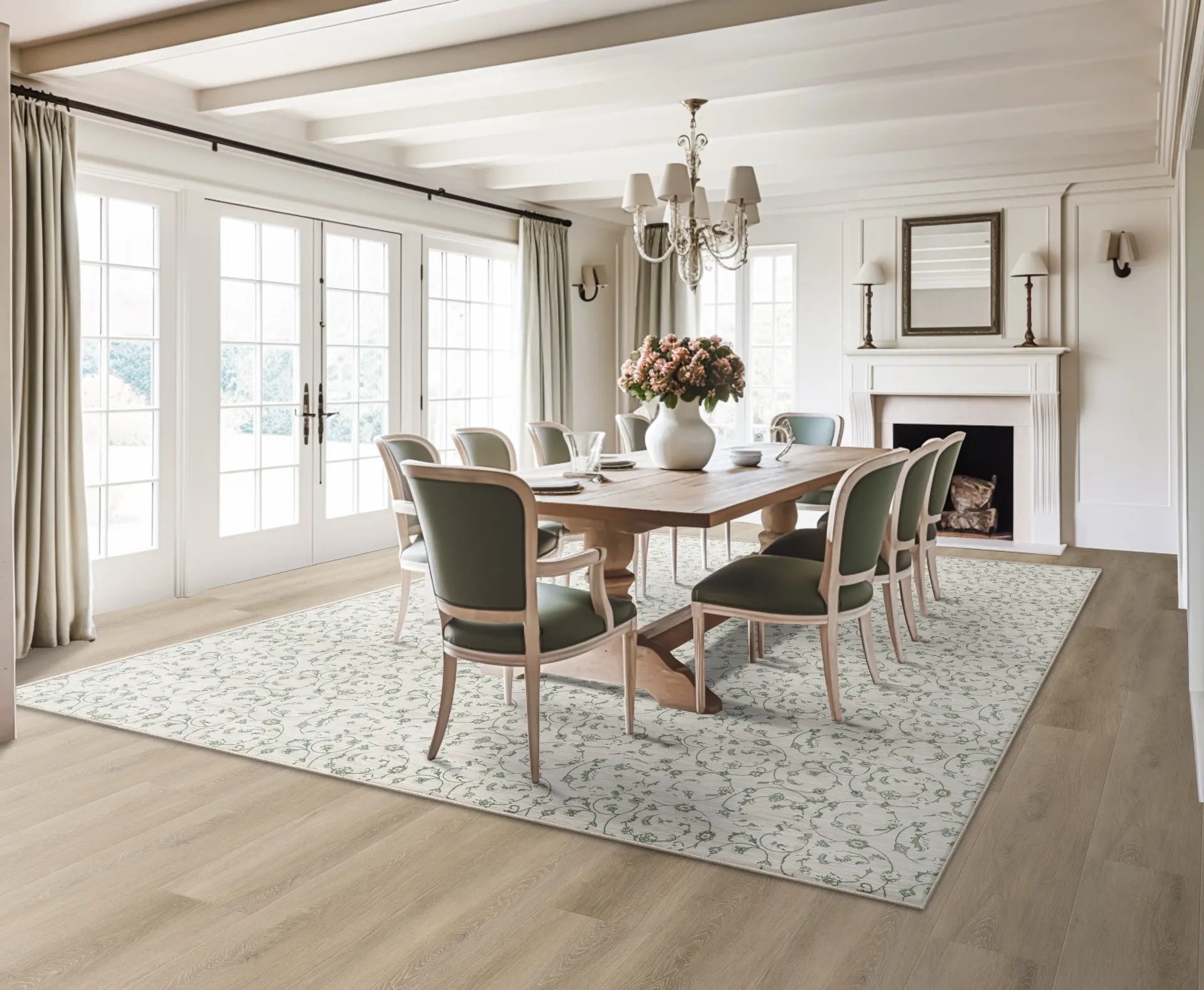 A dining room with a table and chairs and a rug on the floor.