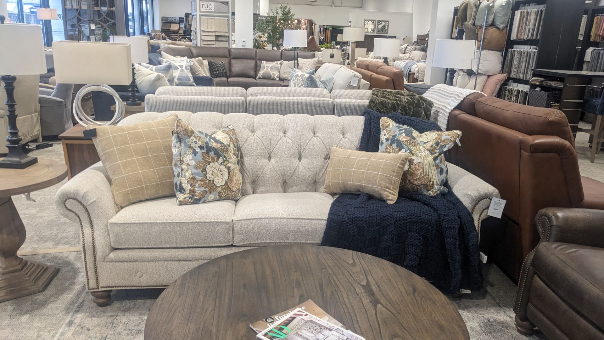 A living room filled with furniture and a couch.